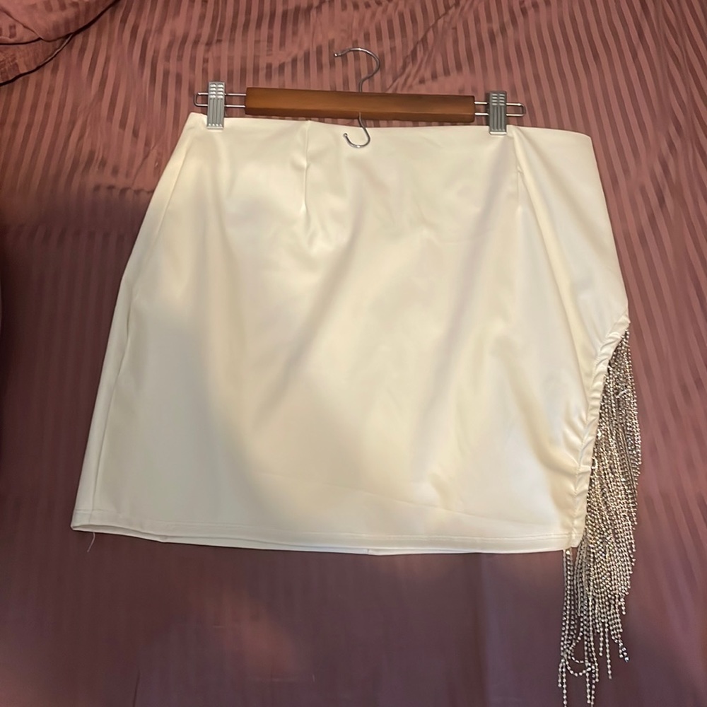 Pleather mini skirt with rhinestone fringe